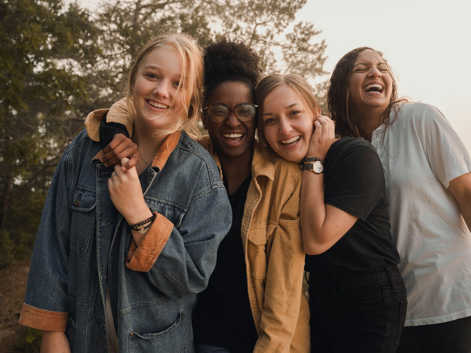 Brown Rice leaders and community — young women laughing together outdoors
