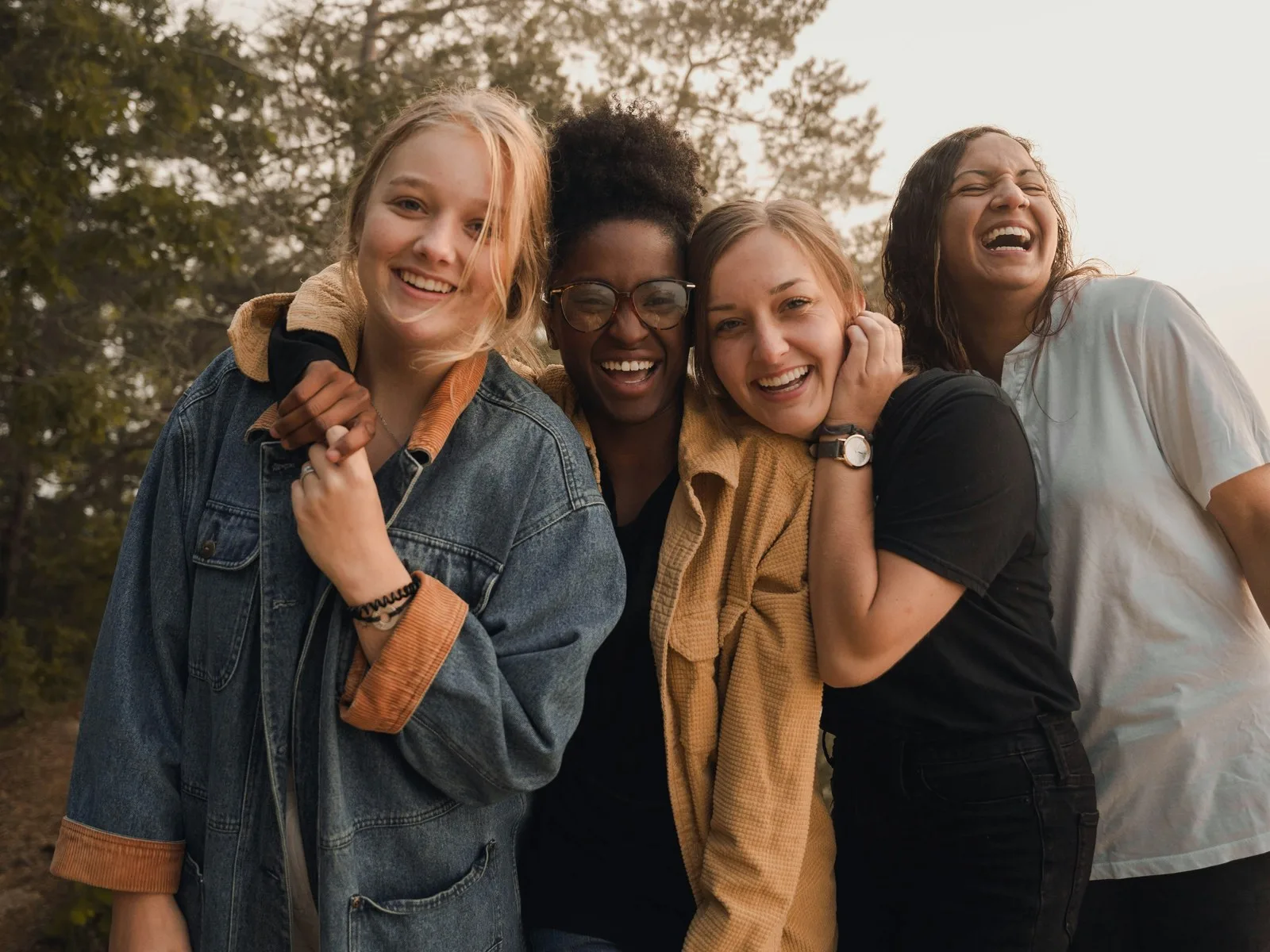 Brown Rice leaders and community — girls laughing together outdoors