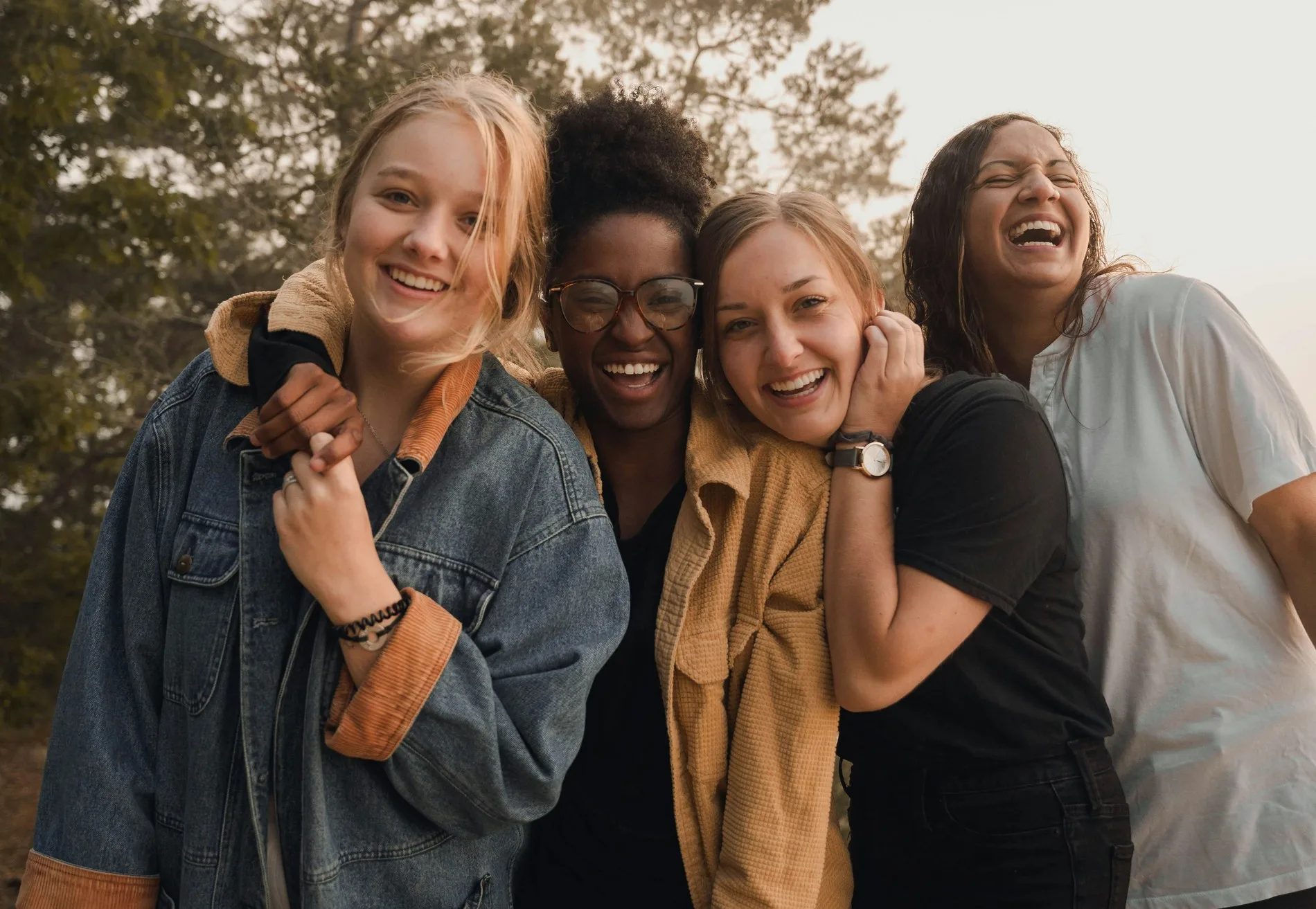 Petal Girls Club members laughing together outdoors